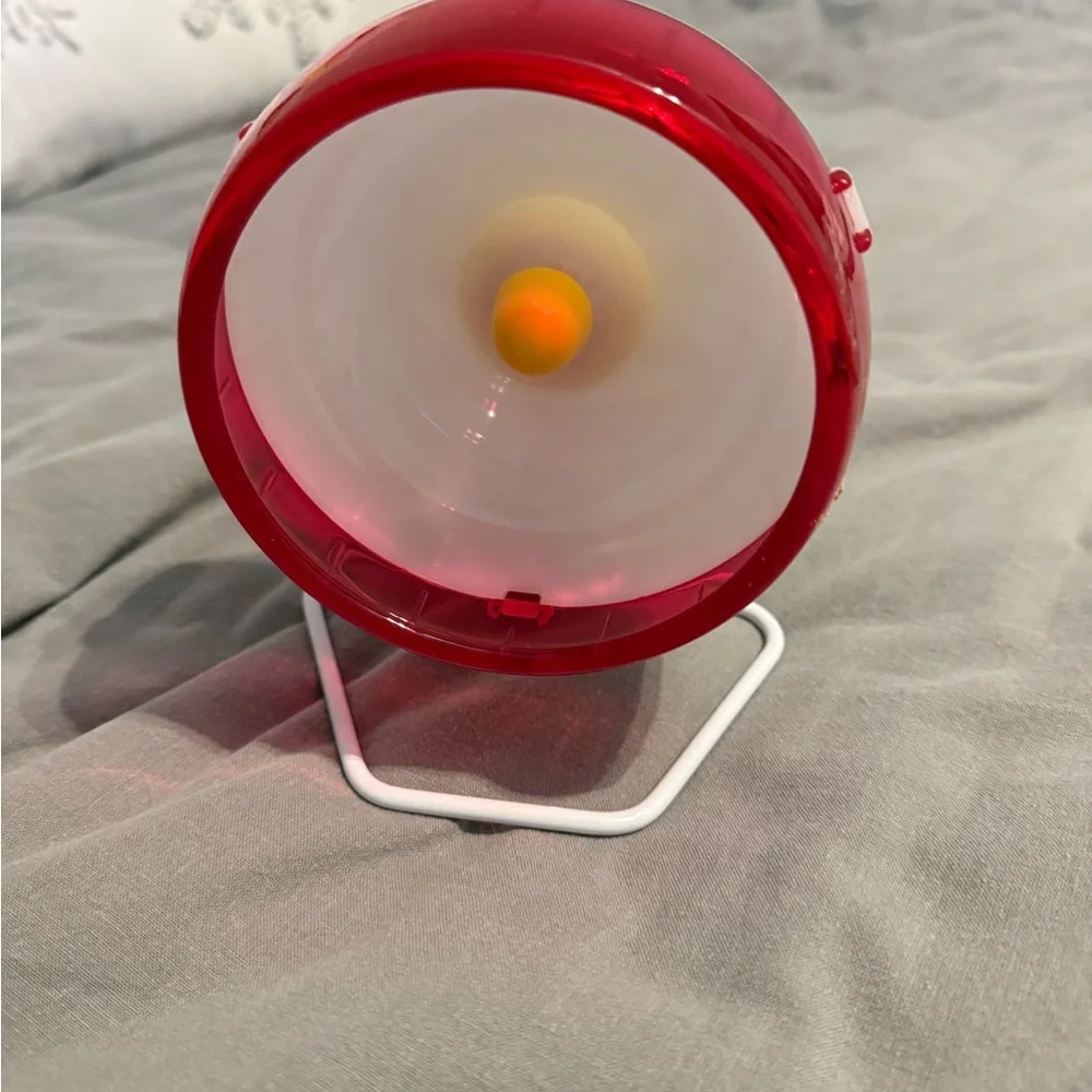 Red and White Circular hamster wheel